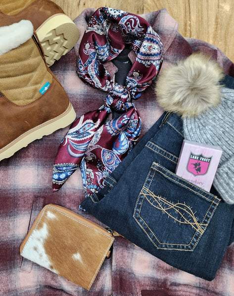 burgundy plaid winter coat with paisley silk scarf, twisted x water proof boots, Tuff jeans, lane frost perfume, grey beanie, and hide on zip wallet