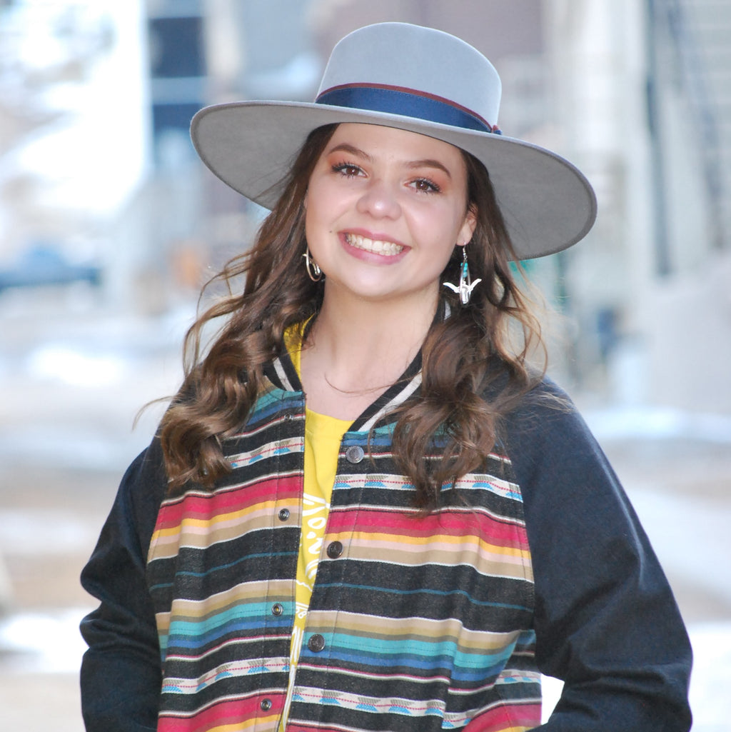 Model is wearing an STS jacket and a Baily Felt hat